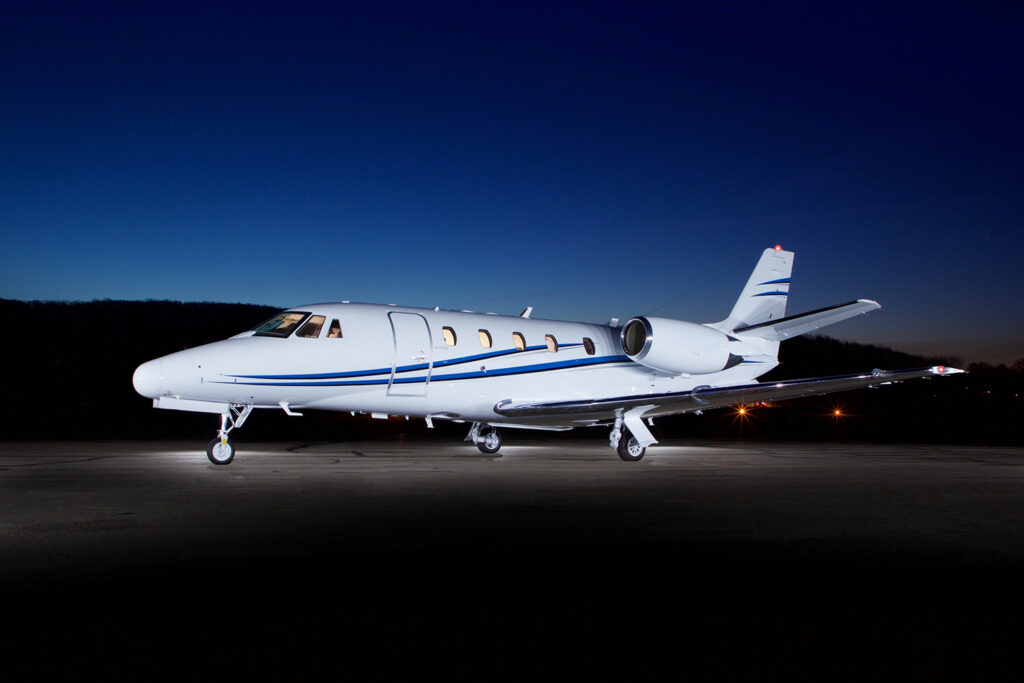 Cessna citation XLS Gen2 private jet on runway at night