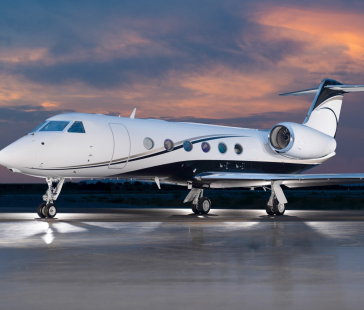 Gulfstream g450 large cabin private jet on runway at dusk